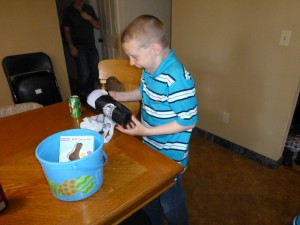 Getting his stacking cups in his Easter basket.  :)